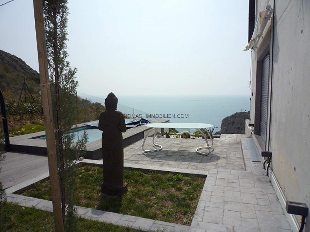 direkt-am-meer-moderne-doppelhaushaelfte-mit-privatpool-in-calpe-valencia